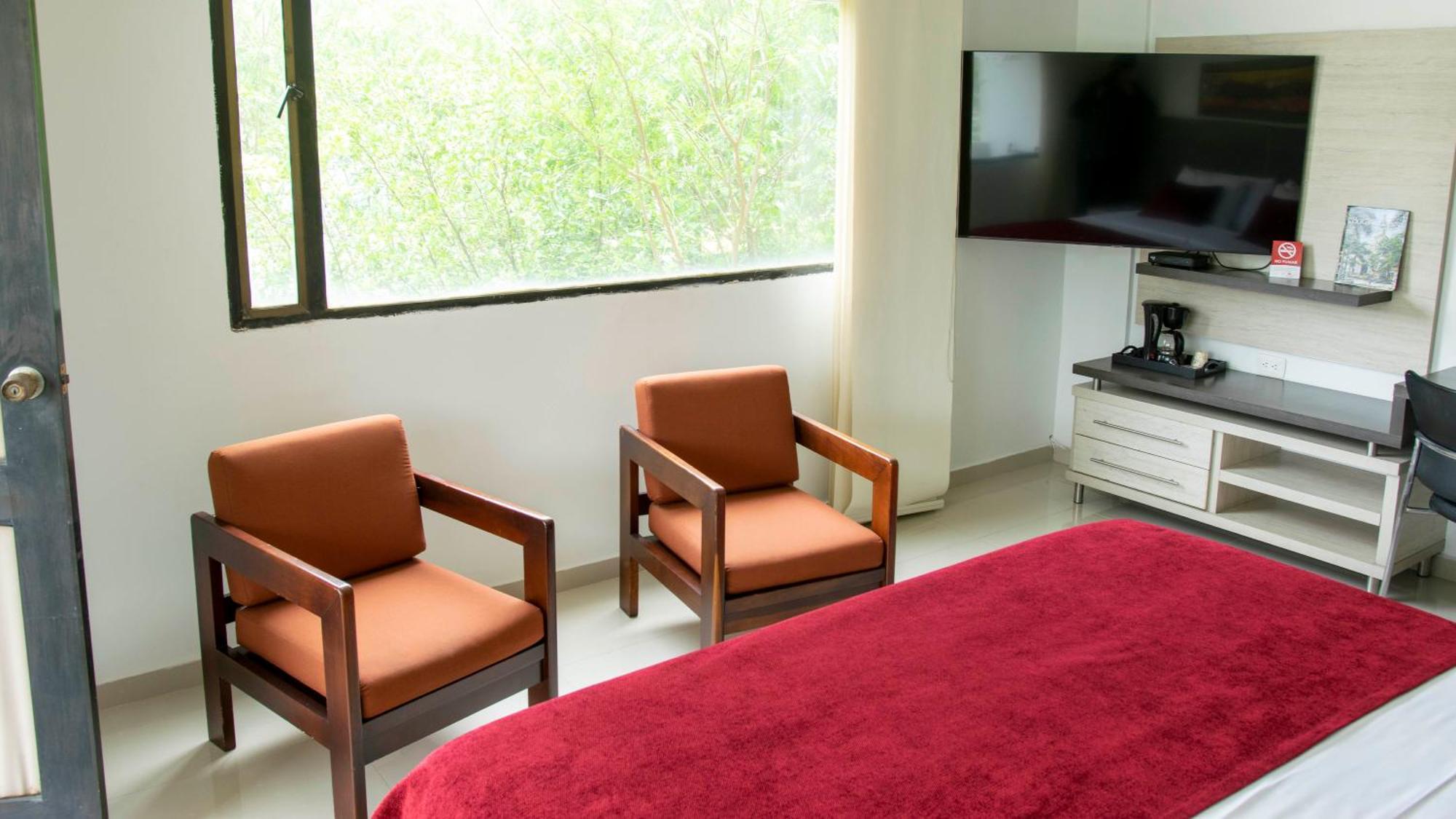 Hotel San Juan Internacional Хирон Экстерьер фото